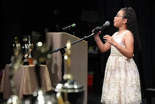 Drama student performing a monologue at Cyril Clark